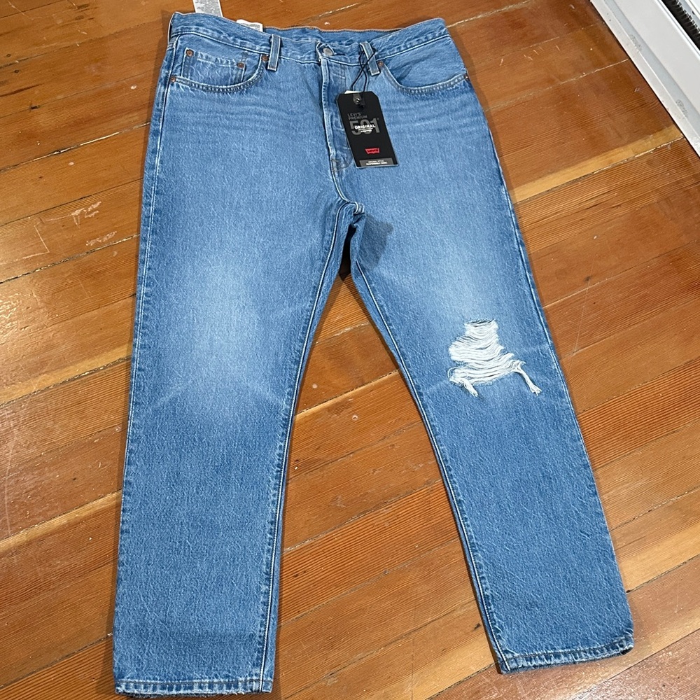 Levi's Light Blue Straight Jeans with Distressed Detail
